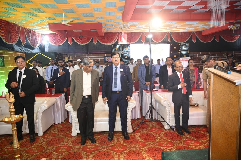 Business leaders discussing safe work environments at GIBF networking event