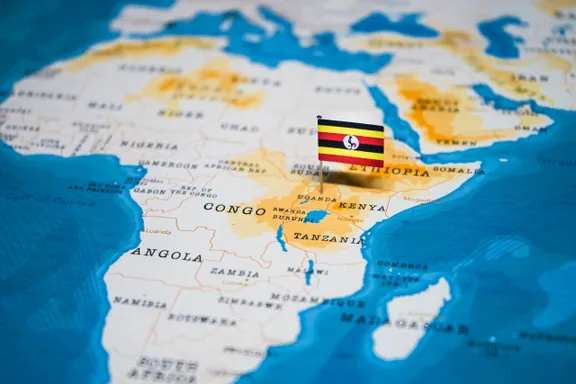 Uganda map flag pin